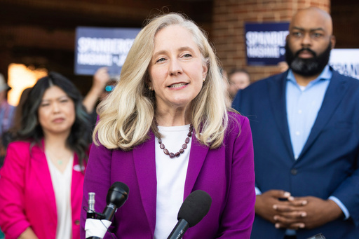 FILE - Democratic gubernatorial candidate Abigail Spanberger speaks to members of the press on the first day of early voting in Henrico County, Sept. 19, 2025. (Mike Kropf /Richmond Times-Dispatch via AP, File) FILE - Democratic gubernatorial candidate Abigail Spanberger speaks to members of the press on the first day of early voting in Henrico County, Sept. 19, 2025. (Mike Kropf /Richmond Times-Dispatch via AP, File)