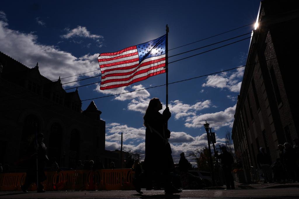 A student with the Interboro High School Marching Band from Prospect Park, Pa. marches in a Veterans Day Parade, Tuesday, Nov. 11, 2025, in Media, Pa. (AP Photo/Matt Slocum)