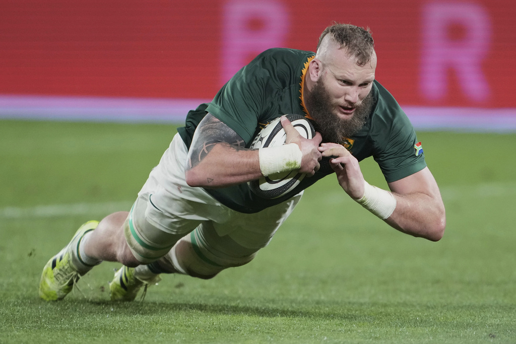 South Africa RG Snyman scores a try their Rugby Championship test match against New Zealand in Wellington, New Zealand, Saturday, Sept. 13, 2025. (AP Photo/Marty Melville)