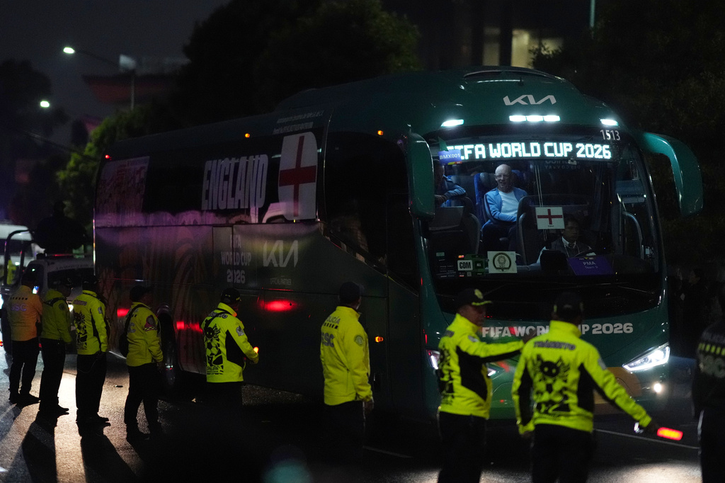 The England team bus arrives at a hotel in Mexico City ahead of England's World Cup round of 16 soccer match against Mexico, Friday, July 3, 2026. (AP Photo/Eduardo Verdugo)