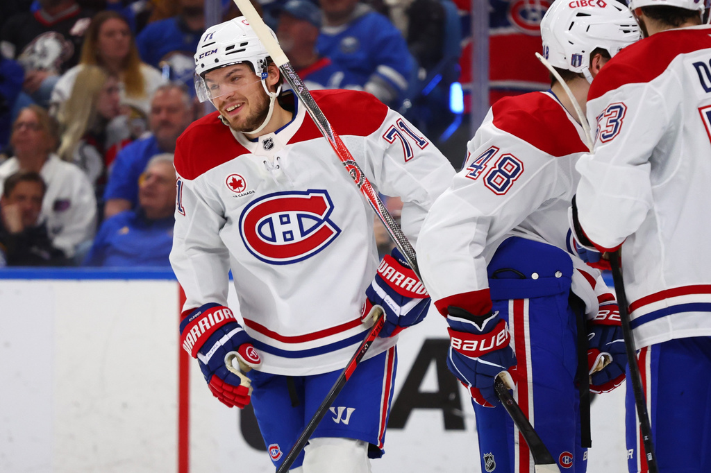 Montreal Canadiens center Jake Evans (71) celebrates his goal during the second period in Game 5 of a second-round NHL hockey Stanley Cup playoff series against the Buffalo Sabres, Thursday, May 14, 2026, in Buffalo, N.Y. (AP Photo/Jeffrey T. Barnes)