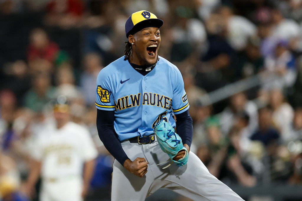 Milwaukee Brewers relief pitcher Abner Uribe (45) reacts after striking out the final batter to end the inning during the eleventh inning of a baseball game against the Athletics, Monday, June 8, 2026, in Las Vegas. (AP Photo/Caroline Brehman)