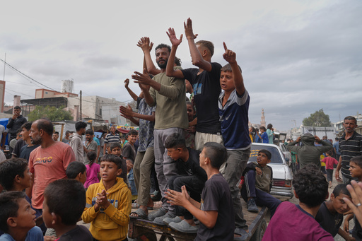 Palestinians celebrate following the announcement that Israel and Hamas have agreed to the first phase of a peace plan to pause the fighting, in Khan Younis, southern Gaza Strip, Thursday, Oct. 9, 2025. Celebrations remain limited, as relief is mixed with mourning and concern for what comes next. (AP Photo/Jehad Alshrafi) Palestinians celebrate following the announcement that Israel and Hamas have agreed to the first phase of a peace plan to pause the fighting, in Khan Younis, southern Gaza Strip, Thursday, Oct. 9, 2025. Celebrations remain limited, as relief is mixed with mourning and concern for what comes next. (AP Photo/Jehad Alshrafi)