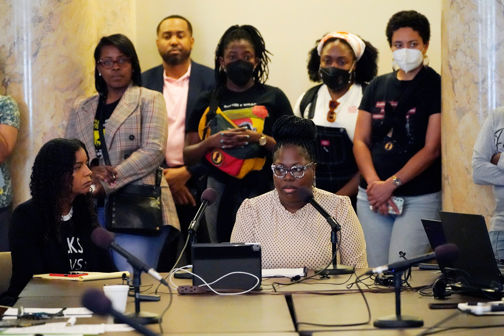 FILE - Arkela Lewis, bottom right, mother of Jaylen Lewis, who was shot to death during an encounter with officers of the Mississippi Capitol Police department, testifies before members of the Jackson delegation of the Mississippi Legislature at the Mississippi Capitol in Jackson, March 6, 2023. (AP Photo/Rogelio V. Solis, File)