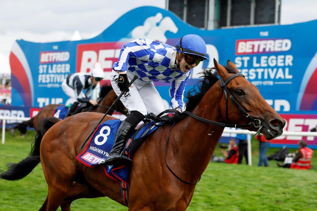 Highwayman, ridden by Saffie Osborne, competes in the Betfred St Leger Stakes on day three of the Betfred St Leger Festival at Doncaster Racecourse in Doncaster, England, Saturday, Sept. 12, 2026. (Richard Sellers/PA via AP)