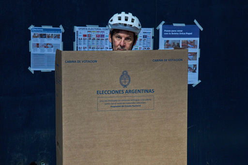 Fabian Gropper casts his vote during legislative midterm elections in Buenos Aires, Argentina, Sunday, Oct. 26, 2025. (AP Photo/Rodrigo Abd) Fabian Gropper casts his vote during legislative midterm elections in Buenos Aires, Argentina, Sunday, Oct. 26, 2025. (AP Photo/Rodrigo Abd)