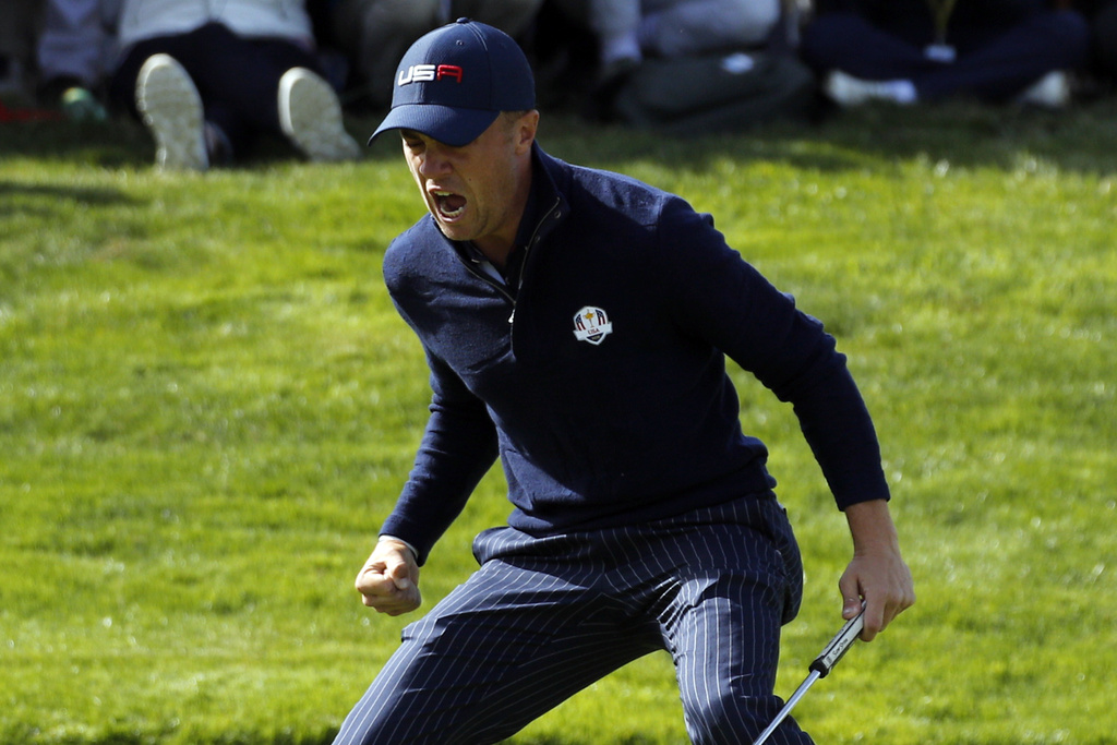 FILE - United States' Justin Thomas reacts after winning his fourball match with his teammate Jordan Spieth on the second day of the 2018 Ryder Cup at Le Golf National in Saint Quentin-en-Yvelines, outside Paris, France, Saturday, Sept. 29, 2018. (AP Photo/Francois Mori)
