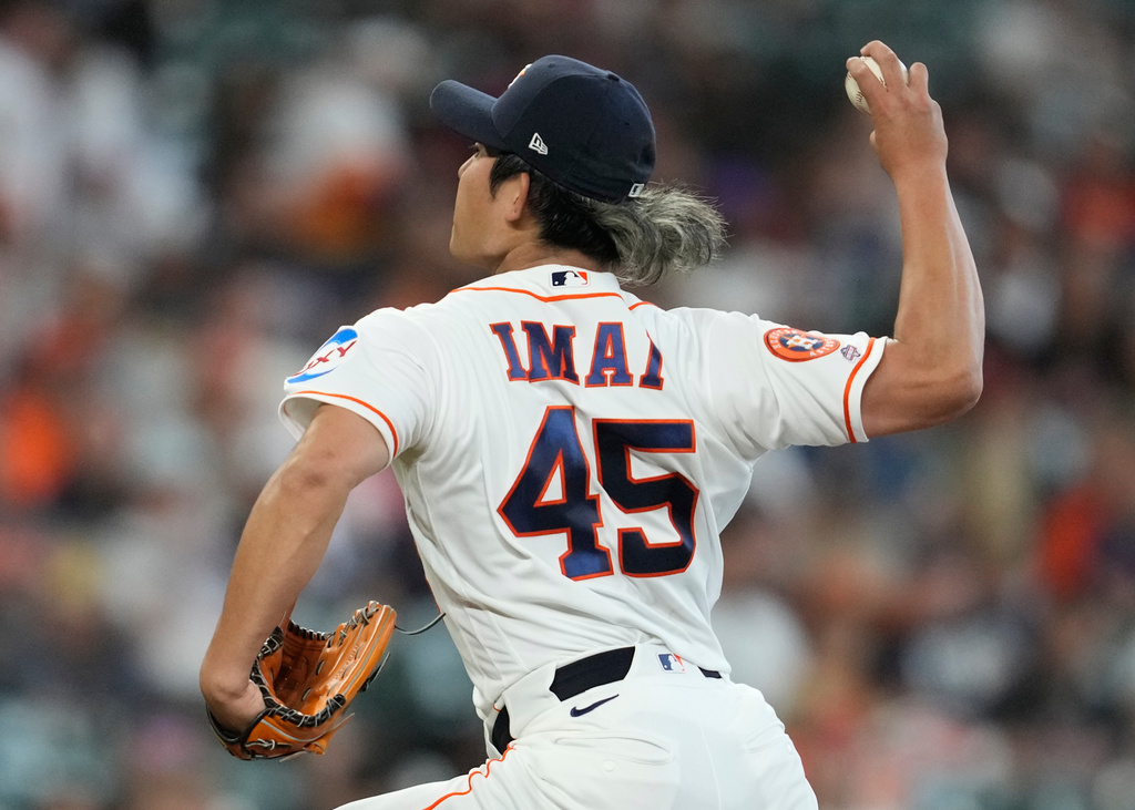 Houston Astros starting pitcher Tatsuya Imai throws during the second inning of a baseball game against the Los Angeles Angels in Houston, Sunday, March 29, 2026. (AP Photo/Ashley Landis)