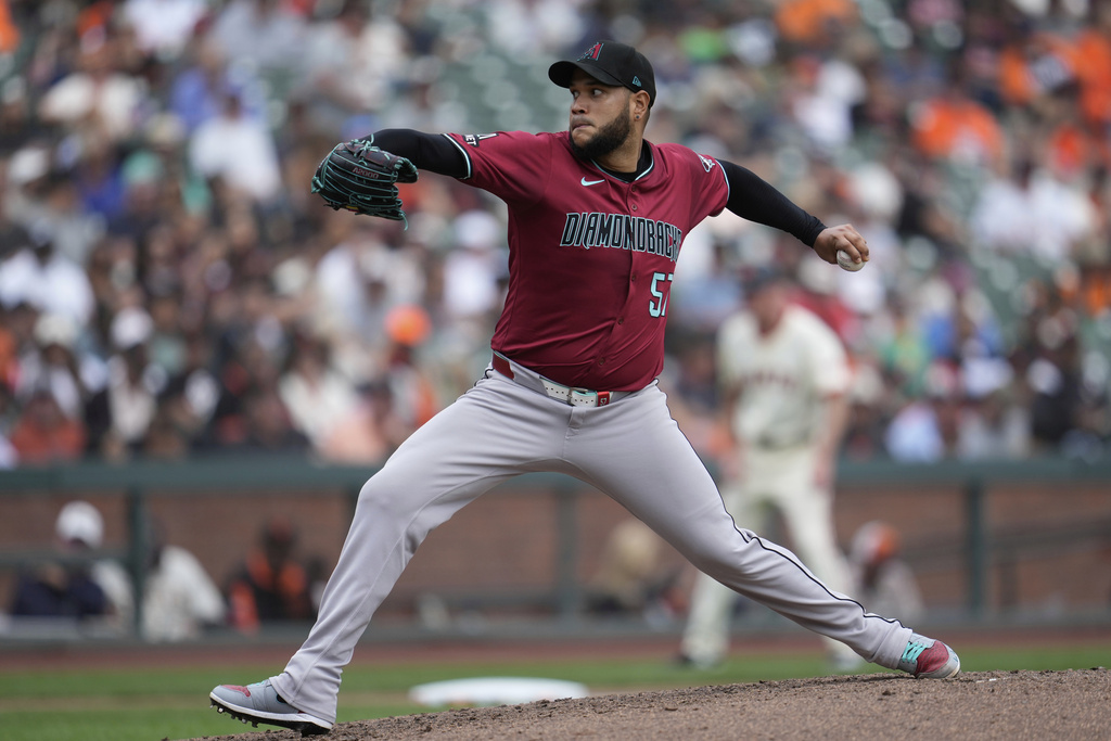 Arizona Diamondbacks pitcher Eduardo Rodriguez throws against the San Francisco Giants during the fifth inning of a baseball game in San Francisco, Wednesday, Sept. 10, 2025. (AP Photo/Jeff Chiu)