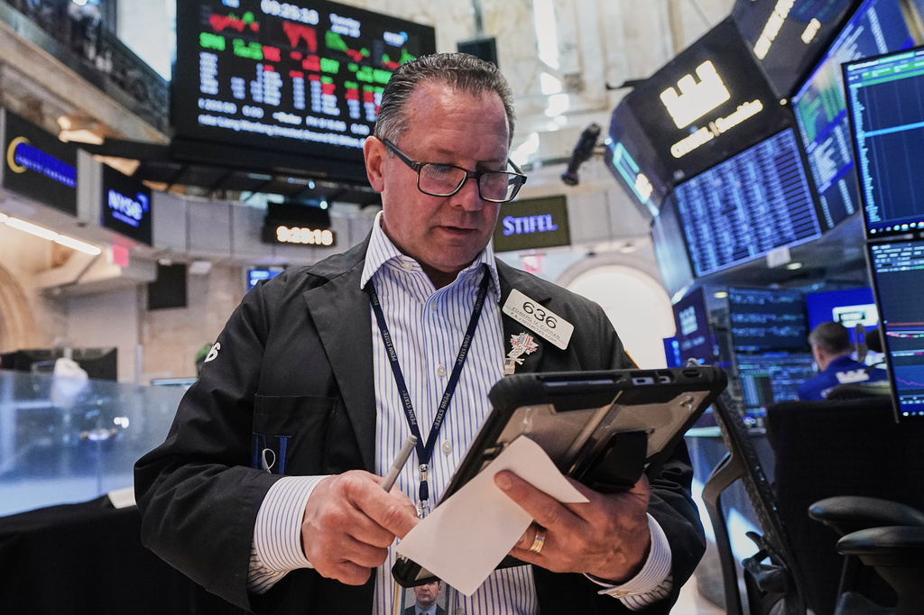 Trader Edward Curran works on the floor of the New York Stock Exchange, Tuesday, June 16, 2026. (AP Photo/Richard Drew)