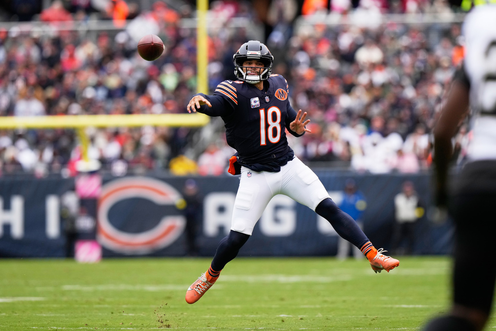 Chicago Bears quarterback Caleb Williams (18) passes against the New Orleans Saints in the first half of an NFL football game, Sunday, Oct. 19, 2025, in Chicago. (AP Photo/Nam Huh)