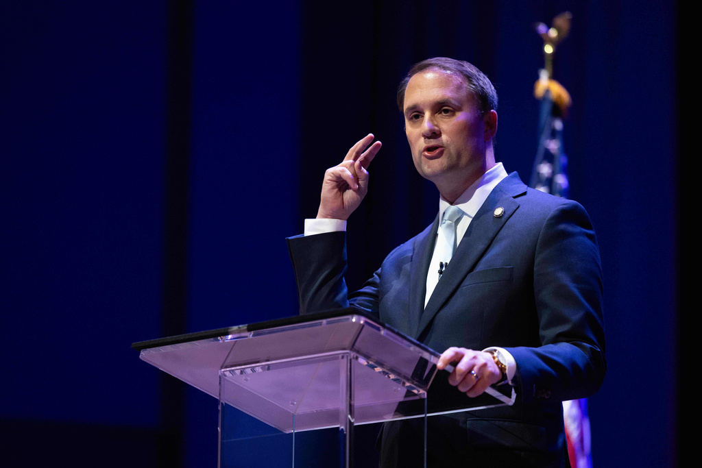 Republican incumbent Jason Miyares participates in the Virginia attorney general debate with Democrat Jay Jones in Richmond, Va., Thursday, Oct. 16, 2025. (Mike Kropf/Richmond Times-Dispatch via AP, Pool)