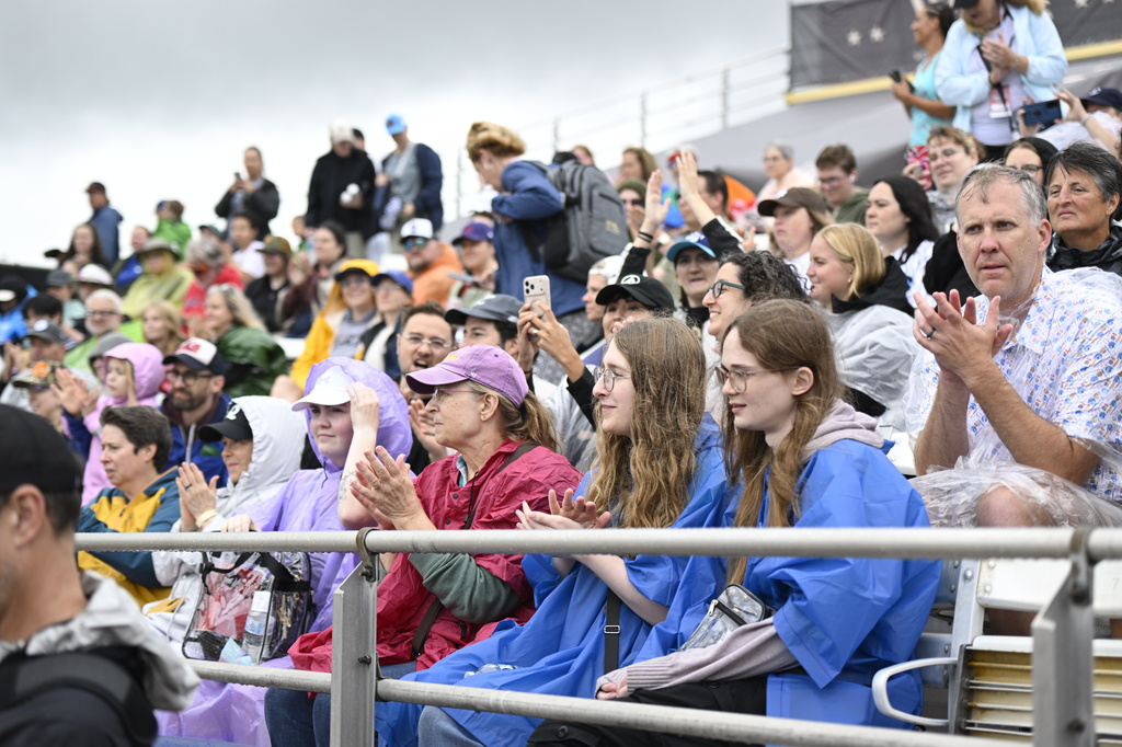 Fans wait for the inaugural Women's Professional Baseball League game between the Los Angeles Queens and the New York Heights, Saturday, Aug. 1, 2026, in Springfield, Ill. (AP Photo/Lexie Knight)