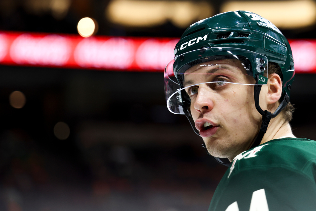 Minnesota Wild center Joel Eriksson Ek communicates on the ice during the second period of an NHL hockey game against the Vancouver Canucks, Saturday, Nov. 1, 2025, in St. Paul, Minn. (AP Photo/Ellen Schmidt)