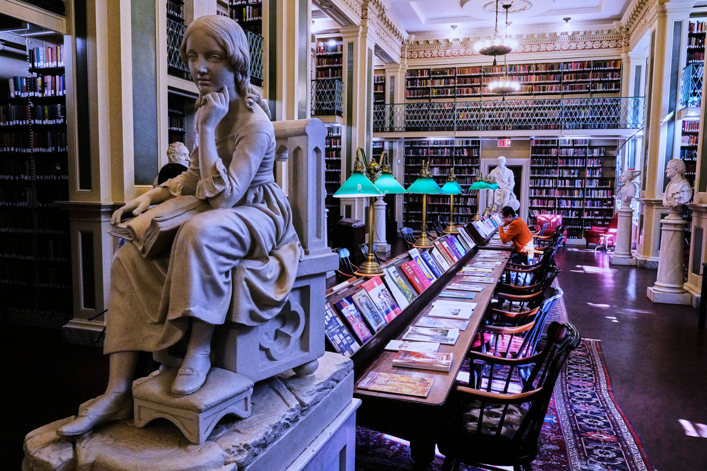 Little Nell, left, a sculpture of the character from Charles Dickens's "The Old Curiosity Shop", is displayed at the Boston Athenaeum, Thursday, Oct. 9, 2025, in Boston. (AP Photo/Charles Krupa)