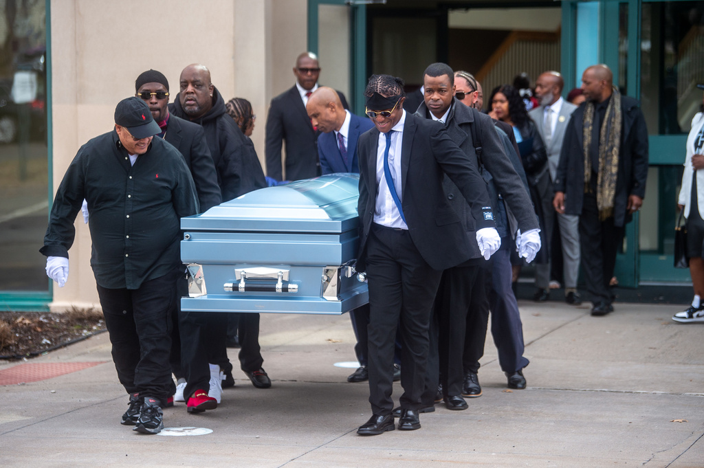 Pallbearers carry out the casket of Steven Jone, a man in a mental health crisis who was shot by police, following Jones' funeral service at The First Cathedral, Thursday, March 26, 2026 in Bloomfield, Conn. (Aaron Flaum/Hartford Courant via AP)