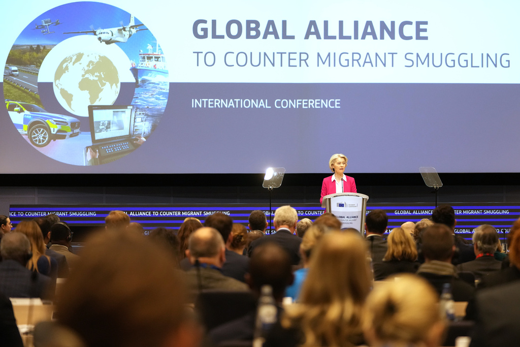 European Commission President Ursula von der Leyen addresses a Conference of the Global Alliance to Counter Migrant Smuggling at the EU Charlemagne building in Brussels, Wednesday, Dec 10, 2025. (AP Photo/Virginia Mayo)