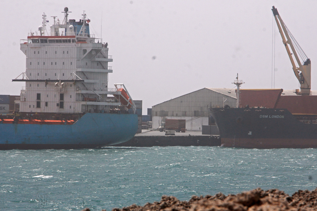 Cargo ships are docked at the port in Mogadishu, Somalia, Thursday, Jan. 8, 2026. (AP Photo/Farah Abdi Warsameh)