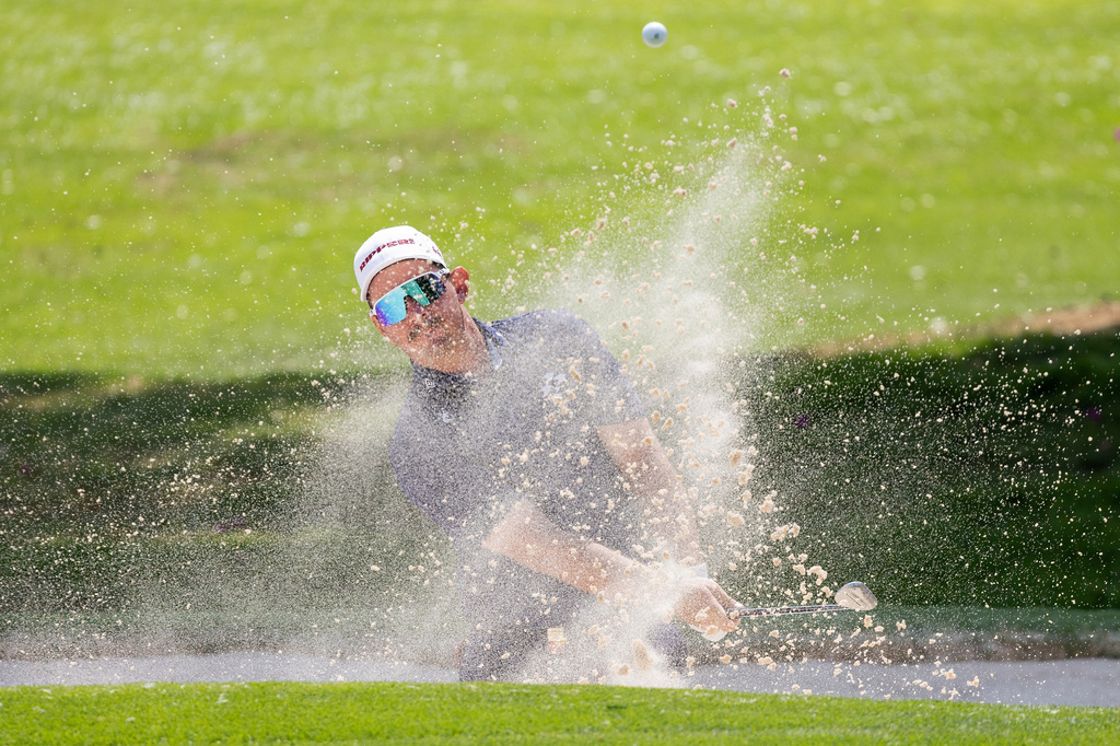 Lucas Herbert of Ripper GC hits his shot from a bunker on the second hole during the first round of LIV Golf Tournament at Club de Golf Chapultepec on Thursday, April 16, 2026, in Naucalpan, Mexico. (Jon Ferrey/LIV Golf via AP)