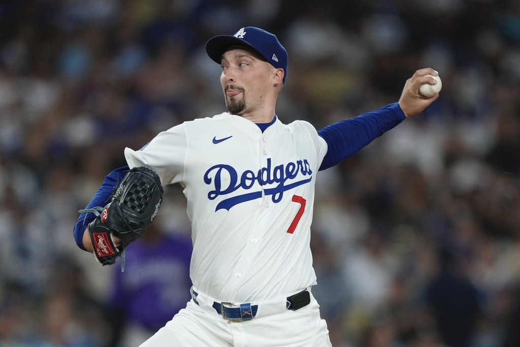 Los Angeles Dodgers starting pitcher Blake Snell throws to the plate during the first inning of a baseball game against the Colorado Rockies, Wednesday, Sept. 10, 2025, in Los Angeles. (AP Photo/Mark J. Terrill)