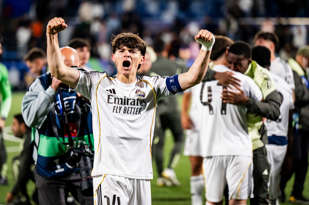 Real Madrid's Carlos Diez celebrates the victory during the Youth League final soccer match between Club Brugge and Real Madrid in Lausanne, Switzerland, Monday, April 20, 2026. (Jean-Christophe Bott/Keystone via AP)