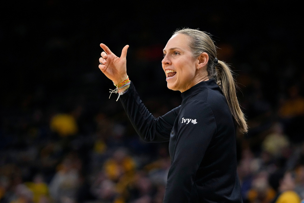 FILE - Princeton head coach Carla Berube directs her players against West Virginia in the first half of a first-round college basketball game in the NCAA Tournament, March 23, 2024, in Iowa City, Iowa. (AP Photo/Matthew Putney, File)