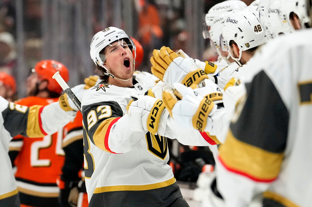 Vegas Golden Knights right wing Mitch Marner, second from left, celebrates his goal with teammates during the first period in Game 6 of a second-round NHL hockey Stanley Cup playoff series against the Anaheim Ducks, Thursday, May 14, 2026, in Anaheim, Calif. (AP Photo/Mark J. Terrill)