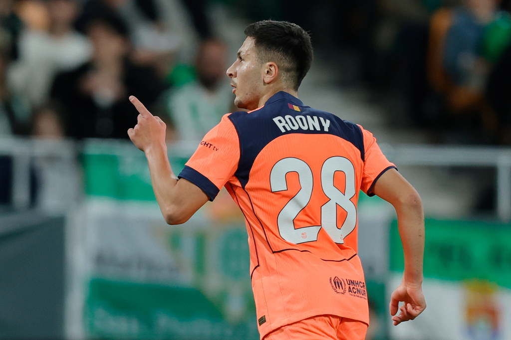 Barcelona's Roony Bardghji celebrates after scoring his sides third goal during the Spanish La Liga soccer match between Real Betis and Barcelona in Seville, Spain, Saturday, Dec. 6, 2025. (AP Phot/Manu Reino)