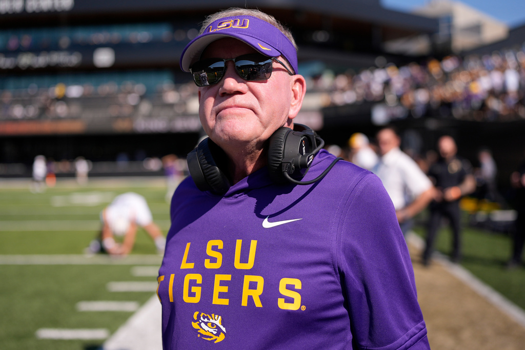 LSU head coach Brian Kelly stands on the sideline during the first half of an NCAA college football game against Vanderbilt, Saturday, Oct. 18, 2025, in Nashville, Tenn. (AP Photo/George Walker IV)