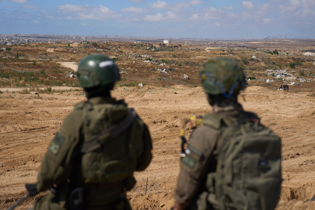 Israeli soldiers occupy a military position overlooking the so-called Yellow Line in the central Gaza Strip, Tuesday, May 26, 2026. (AP Photo/Ariel Schalit)