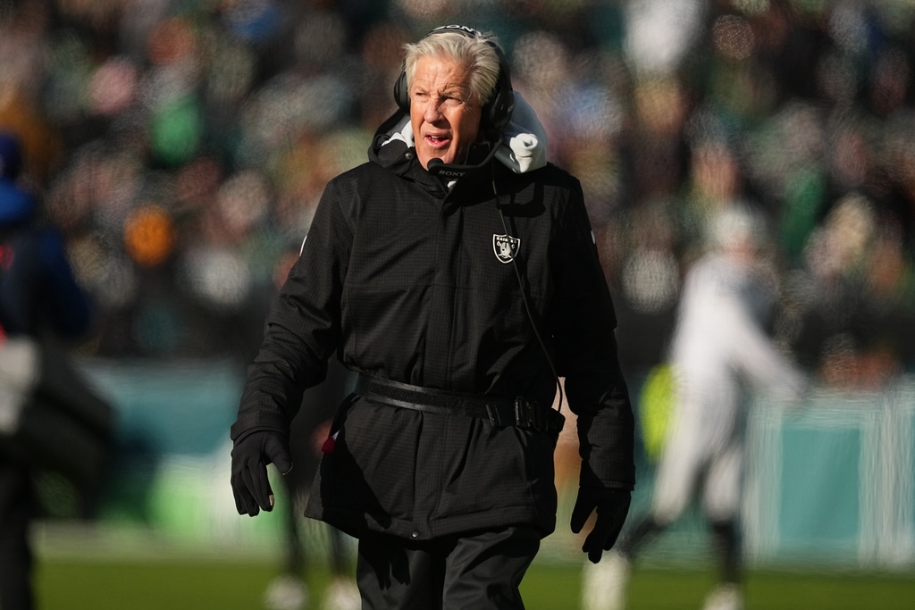 Las Vegas Raiders head coach Pete Carroll walks the sidelines during the first half of an NFL football game against the Philadelphia Eagles on Sunday, Dec. 14, 2025, in Philadelphia. (AP Photo/Matt Rourke)