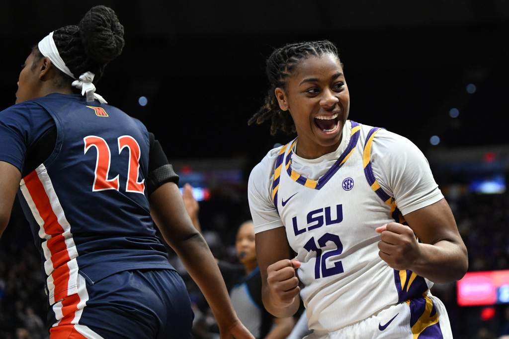 LSU guard Mikayla Williams (12) celebrates in the first half of an NCAA college basketball game against Morgan State, Tuesday, Dec. 16, 2025, in Baton Rouge, La. (AP Photo/Ella Hall)