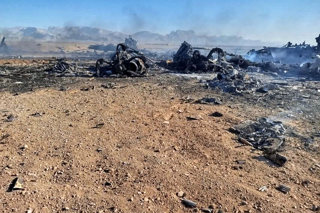 In this image provided by Sepahnews, the Iranian Revolutionary Guard's official website, wreckage is shown at what Iran's state TV claimed was the site of a downed American transport plane and two helicopters involved in a rescue operation, in Isfahan province, Iran, April, 2026. (Sepahnews via AP)