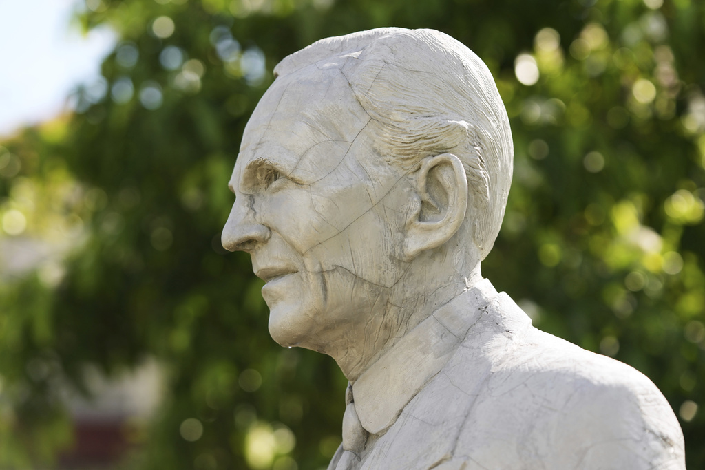 A sculpture of Henry Ford is displayed at the Edison and Ford Winter Estates, Saturday, Aug. 9, 2025, in Fort Myers, Fla., which date from 1885, when Edison purchased the property. (AP Photo/Lynne Sladky)