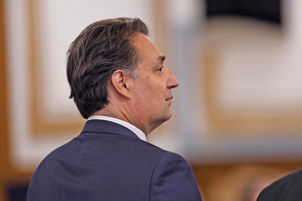 Brian Walshe stands after being found guilty of first degree murder of his wife Ana in 2023 by a Norfolk Superior Court jury in Dedham, Mass., Monday, Dec. 15, 2025. (Greg Derr/The Patriot Ledger via AP, Pool)