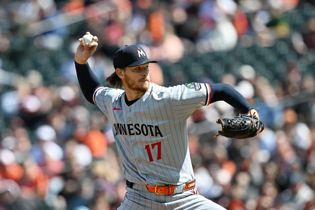 Minnesota Twins pitcher Bailey Ober delivers a pitch against the Baltimore Orioles during the first inning of a baseball game, Sunday, March 29, 2026 in Baltimore.(AP Photo/Gail Burton)