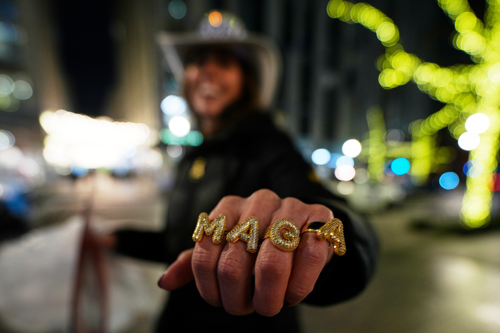 FILE - Alicia DeVinney of Phoenixville, Pa., shows off her MAGA rings ahead of the 60th Presidential Inauguration, Jan. 19, 2025, in Washington. (AP Photo/Mike Stewart, File)