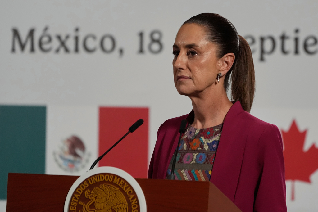 FILE - Mexico's President Claudia Sheinbaum speaks during a joint press conference with Canada's Prime Minister Mark Carney at the National Palace in Mexico City, Sept. 18, 2025. (AP Photo/Fernando Llano, File)