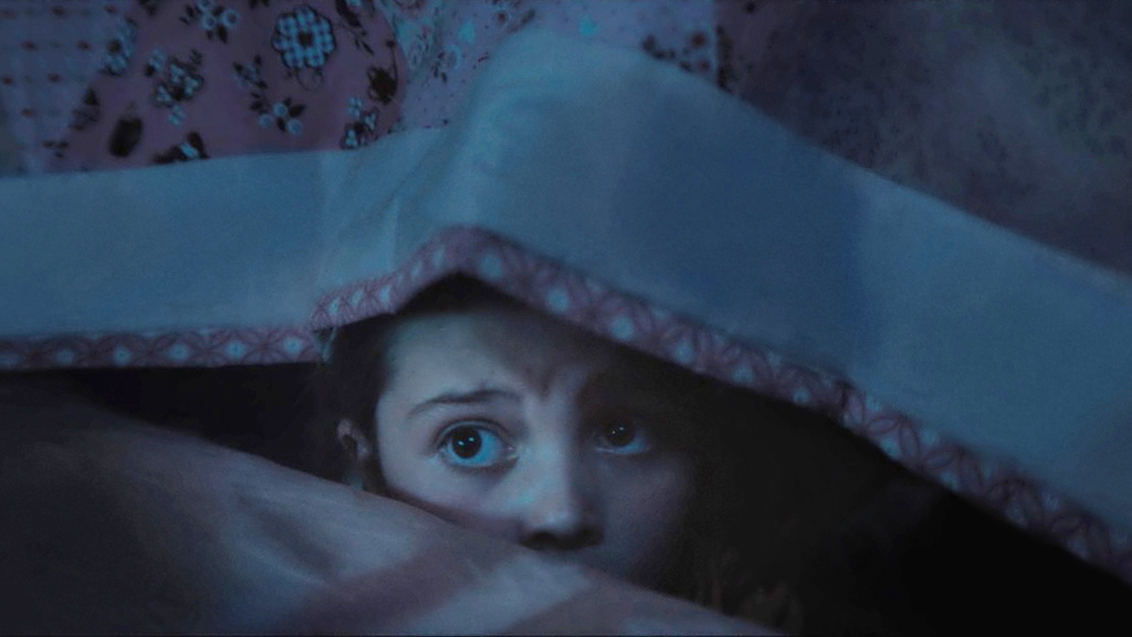 This image released by Roadside Attractions shows Sophie Sloan in a scene from "Dust Bunny." (Roadside Attractions via AP)