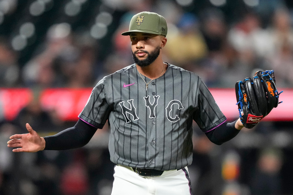 New York Mets pitcher Devin Williams reacts after winning a baseball game against the New York Yankees, Saturday, May 16, 2026, in New York. (AP Photo/Yuki Iwamura)