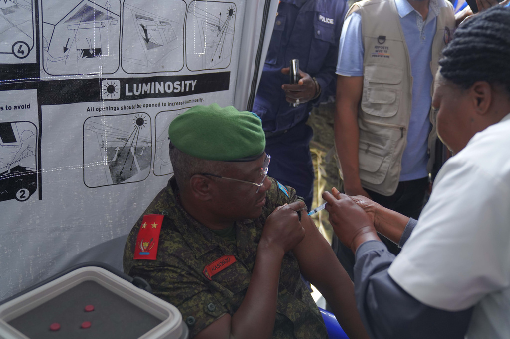 Governor of Ituri province Gaby Kasongo Mulumba receives the first dose of the Ervebo Ebola vaccine to encourage the population to do so, at an Ebola vaccination center in Bunia, Ituri province, Congo, Saturday, Sept. 19, 2026. (AP Photo/Dieudonne Dirole)