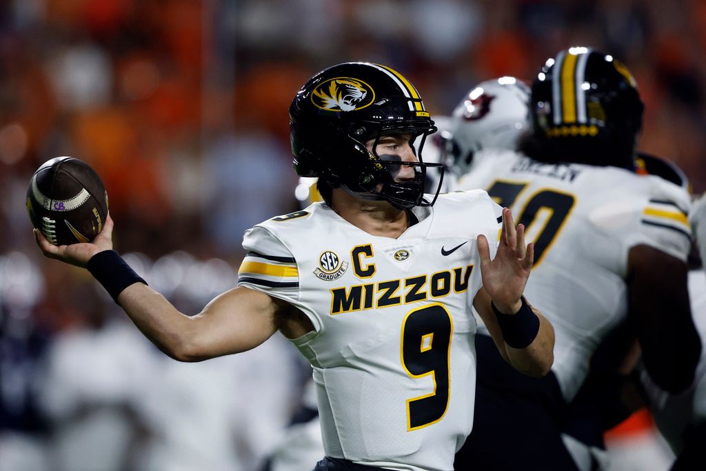 Missouri quarterback Beau Pribula (9) looks to throw a pass during the first half of an NCAA college football game against Auburn, Saturday, Oct. 18, 2025, in Auburn, Ala. (AP Photo/Butch Dill)