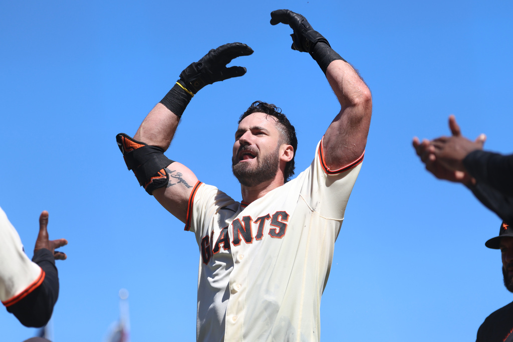 San Francisco Giants' Bryce Eldridge celebrates after hitting a game winning grand slam against the Washington Nationals during the ninth inning of a baseball game in San Francisco, Wednesday, June 10, 2026. (AP Photo/Jed Jacobsohn)