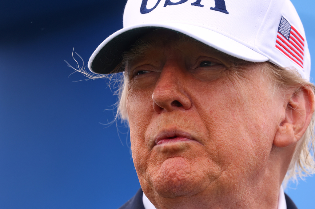 U.S. President Donald Trump attends the Irish Open at the Trump International Golf Links course in Doonbeg, Ireland, Sunday, Sept. 13, 2026.(AP Photo/Peter Morrison)