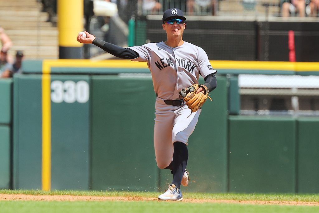 New York Yankees' Anthony Volpe throws to first base to get Chicago White Sox' Braden Montgomery out during the second inning of a baseball game, Thursday, July 30, 2026, in Chicago. (AP Photo/Melissa Tamez)