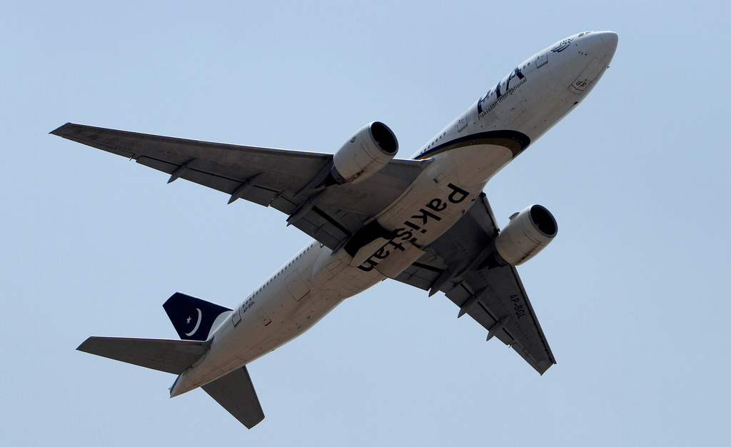 FILE -In this June 8, 2013 photo, a Pakistani International Airline plane takes off from Benazir Bhutto airport in Islamabad, Pakistan. (AP Photo/Anjum Naveed, File)