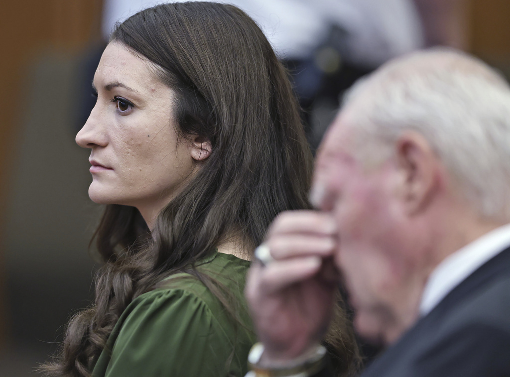 Lindsay Clancy watches jury members as Judge William Sullivan polls them before they start deliberations during her murder trial at Plymouth Superior Court in Plymouth, Mass., Monday, Aug. 31, 2026. (Greg Derr/The Patriot Ledger via AP, Pool)