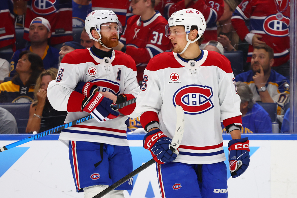 Montreal Canadiens right wing Zachary Bolduc, right, celebrates after his goal with defenseman Mike Matheson (8) during the first period in Game 7 of a second-round NHL hockey Stanley Cup playoff series against the Buffalo Sabres, Monday, May 18, 2026, in Buffalo, N.Y. (AP Photo/Jeffrey T. Barnes)