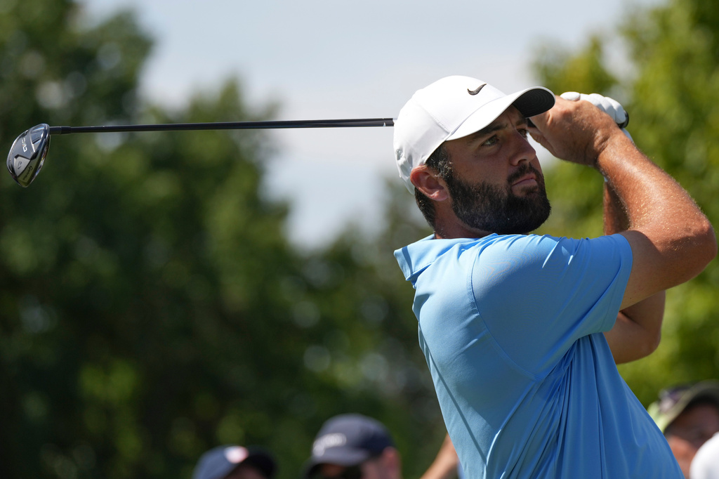 Scottie Scheffler hits from the second tee in the final round of the BMW Championship golf tournament, Sunday, Aug. 23, 2026, in St. Louis. (AP Photo/Jeff Roberson)