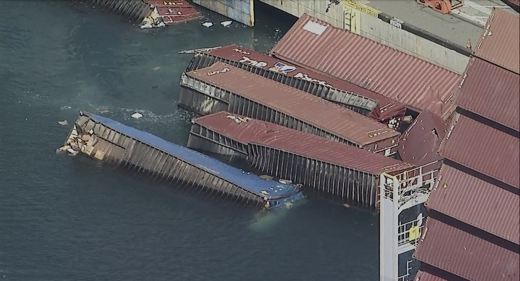 Several shipping containers have fallen off a cargo ship and into the water at the Port of Long Beach, Calif., on Tuesday, Sept. 9, 2025. (KABC-TV via AP)